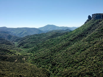 Scenic view of mountains against clear sky