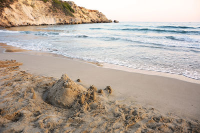 Sand castle on the seashore.