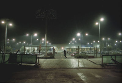 Illuminated street lights at night