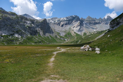 Scenic view of snowcapped mountains against sky