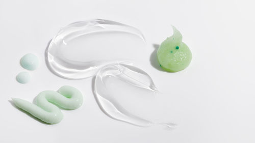 Close-up of dentures over white background