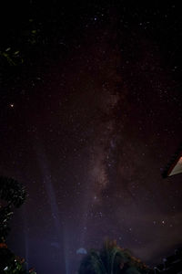 Low angle view of star field against sky