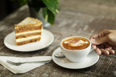 Close-up of coffee and cup on table