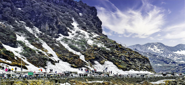 Scenic view of snowcapped mountains against sky