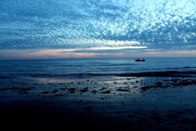 View of calm sea at sunset