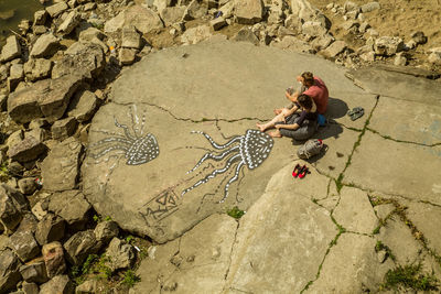 Woman standing on rocks