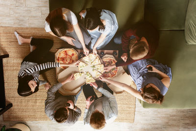 High angle view of people at home