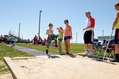 People standing on sunny day