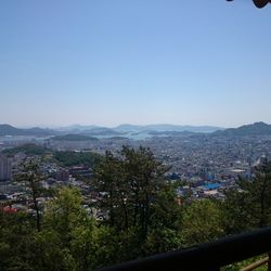 Cityscape against clear sky