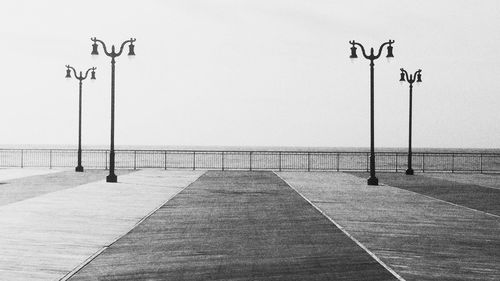 Empty road against clear sky