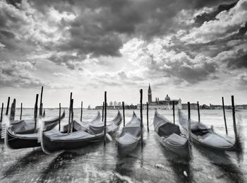 Boats moored in sea