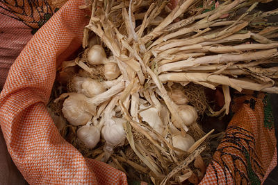 High angle view of garlic for sale in market