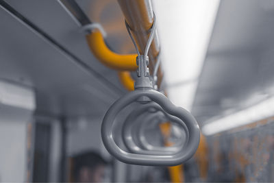 Low angle view of chain hanging from train