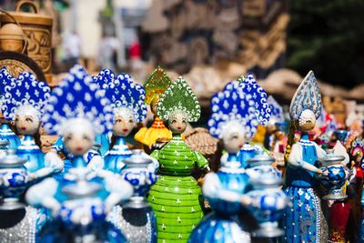 Close-up of figurines for sale in market