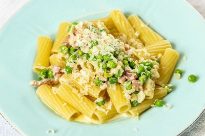 High angle view of pasta in plate on table