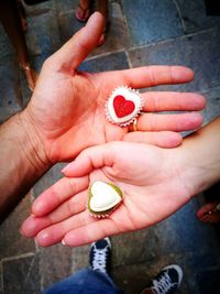 Close-up of hand holding ice cream