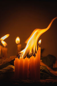 Close-up of burning candle