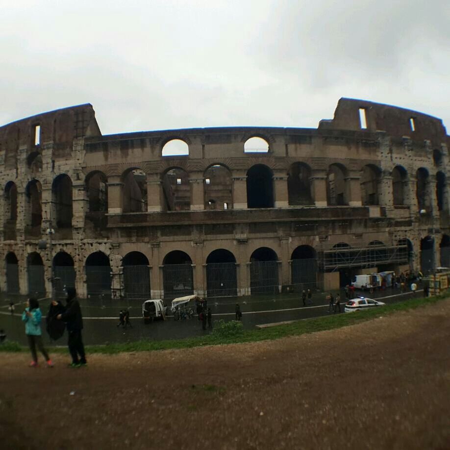 architecture, built structure, building exterior, arch, history, sky, famous place, travel destinations, men, large group of people, tourist, tourism, person, grass, travel, lifestyles, leisure activity, international landmark, facade