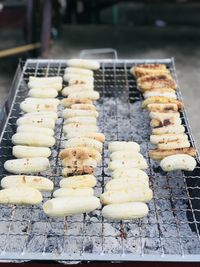 High angle view of meat on barbecue grill