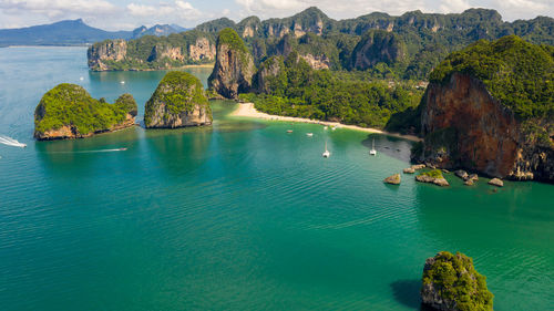 Amazing thailand high season beautiful seascape aerial view ao nang beach island and long tail 