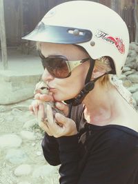 Close-up of woman standing in pond