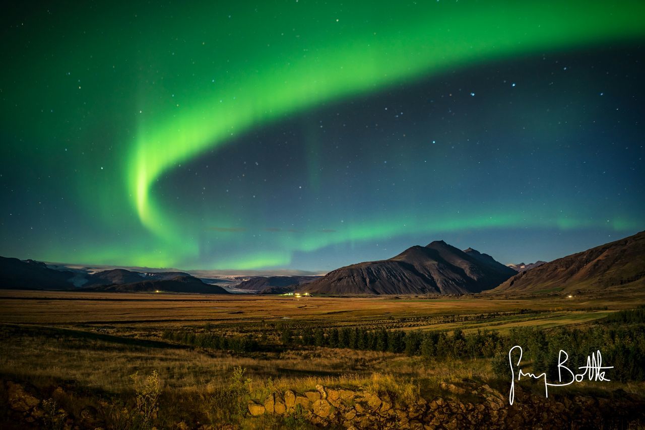 SCENIC VIEW OF LANDSCAPE AGAINST SKY AT NIGHT