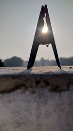 Close-up of sun shining on beach