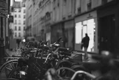 Bicycles parked on street against building