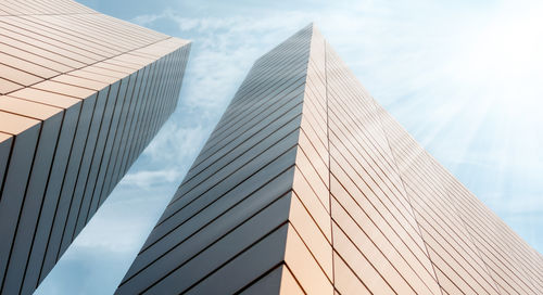 Low angle view of modern buildings against sky