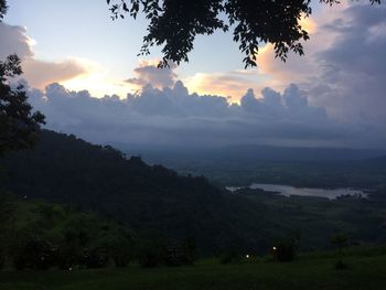 Scenic view of landscape against sky during sunset