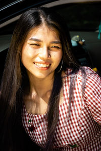 Portrait of a smiling young woman
