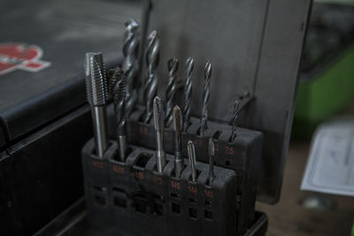 Close-up of drill bit in toolbox
