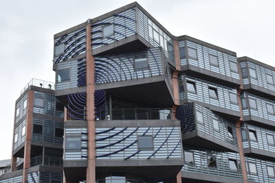 Low angle view of modern building against sky