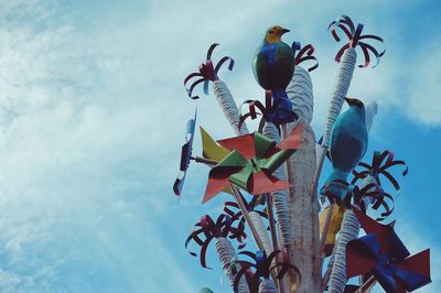 Low angle view of birds in sky