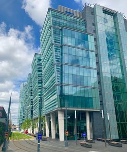 Low angle view of modern building against sky