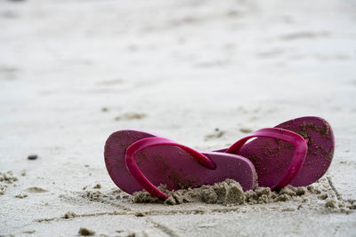 Close-up of heart shape on sand