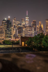 Illuminated buildings in city at night