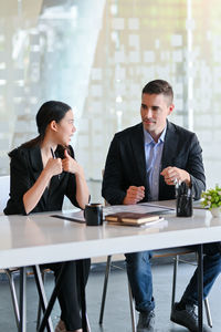 Business colleagues working at office