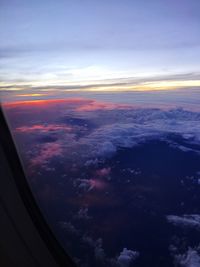 Aerial view of landscape against sky during sunset