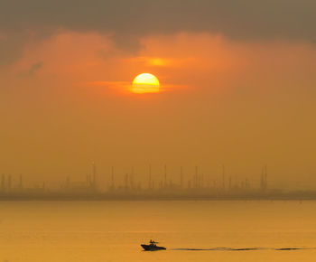 Scenic view of silhouette landscape against sky during sunset