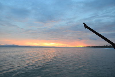 Scenic view of sea at sunset