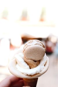 Close-up of hand holding dessert