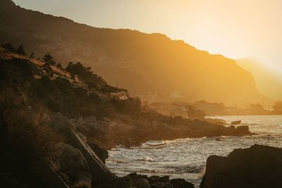 Scenic view of sea against sky during sunset