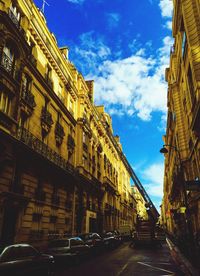 Road along buildings in city