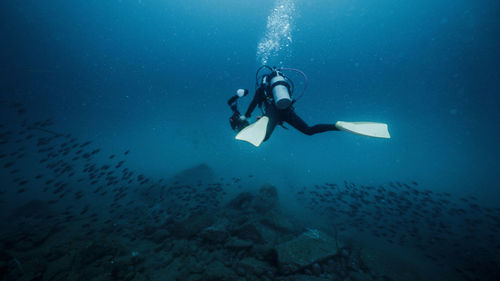 Man swimming in sea