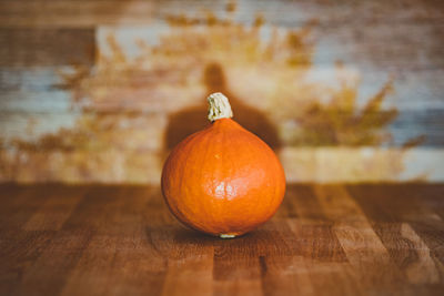 Close-up of orange pumpkin on table