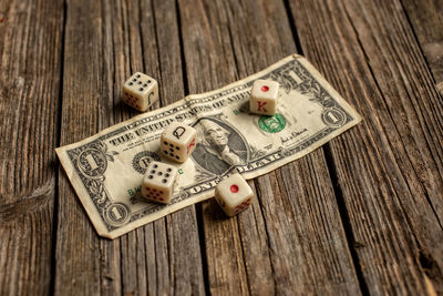 High angle view of coins on table