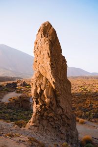 Scenic view of rock formation against clear sky