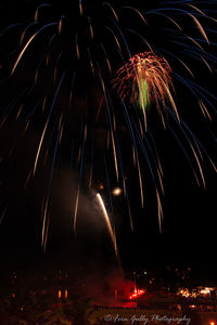 Firework display at night