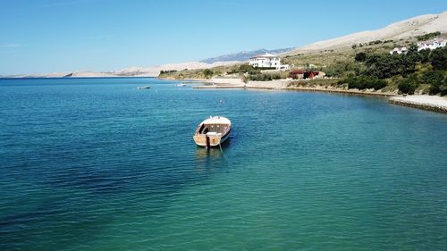 Scenic view of sea against blue sky